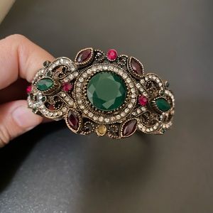 Rusted copper toned bracelet.